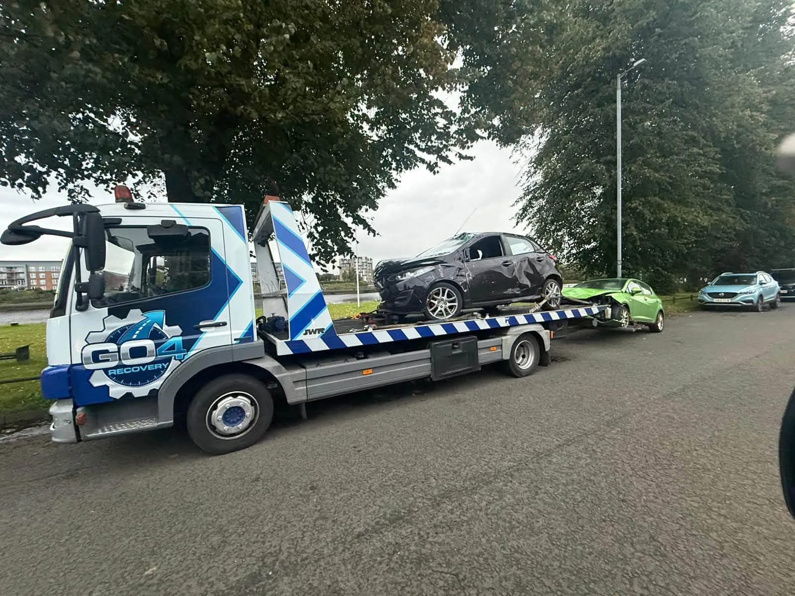 GO4 Recovery truck collecting an accident-damaged car